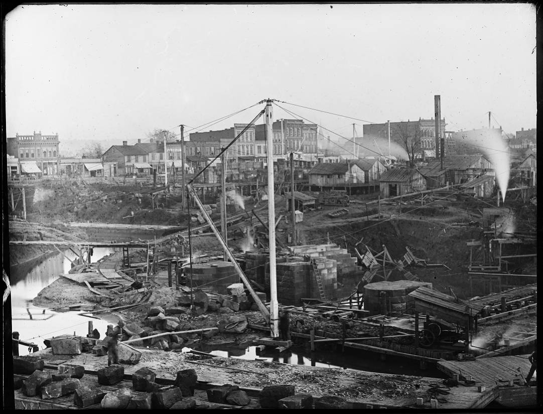 Original black-and-white historic construction and industrial scene